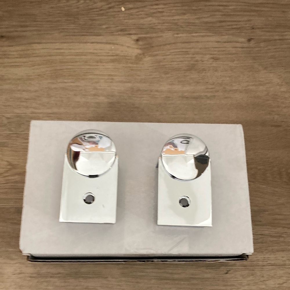 Chrome end caps for Artemide bathroom vanity light
